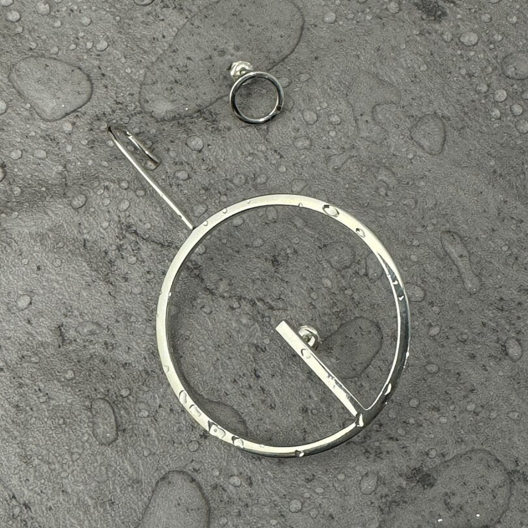 Sterling silver circle mono earring