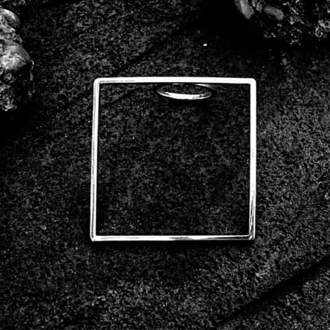 Square Ring in handcrafted 925 sterling silver featuring a bold, structured square design.