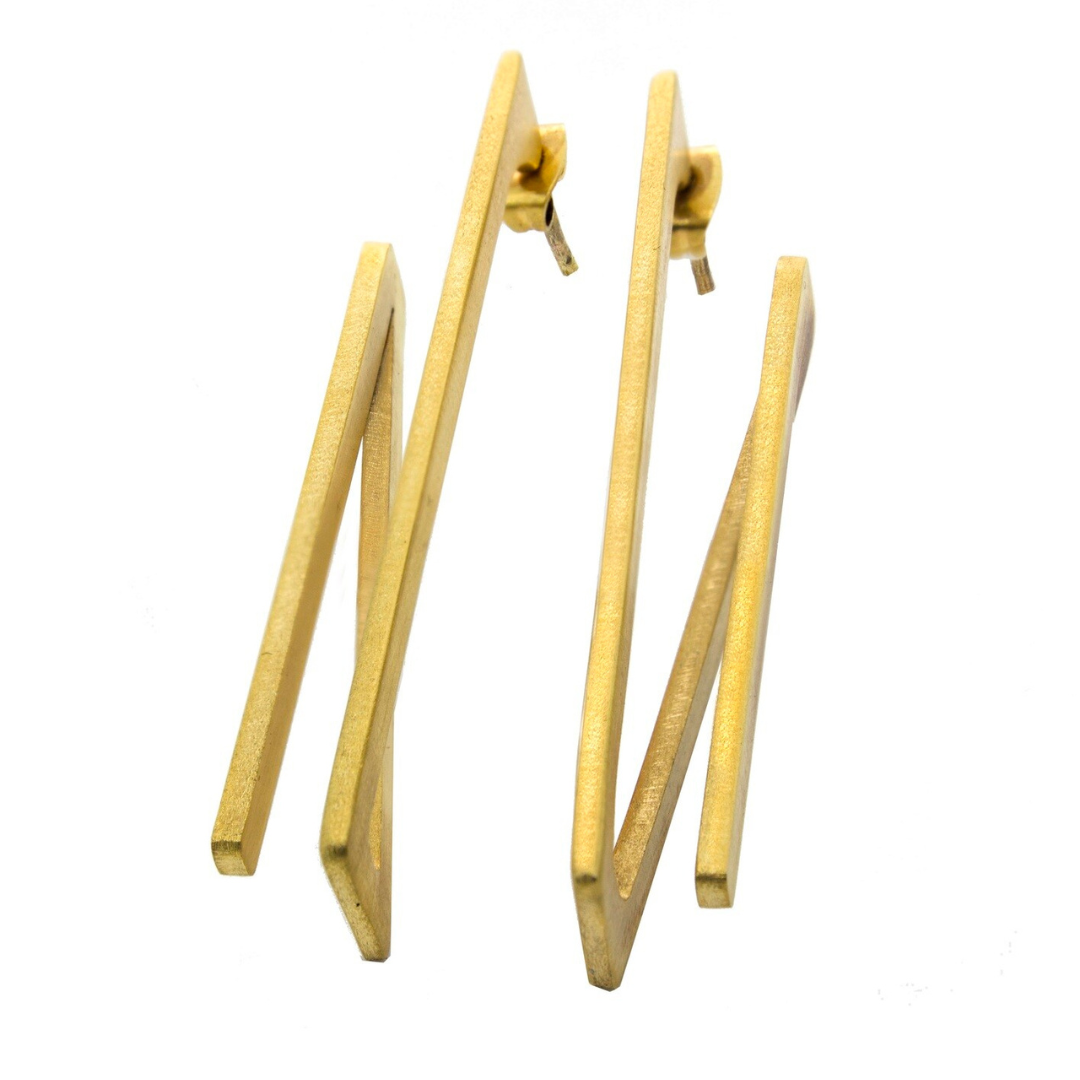 Contemporary gold plated brass earrings with angular 2D rotation design, lightweight and sculptural