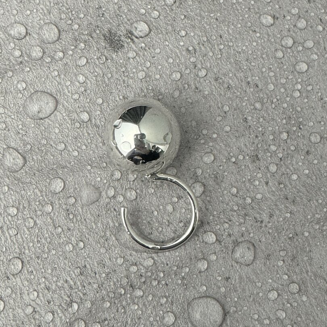 One Ball Ring in handmade 925 sterling silver featuring a bold, oversized sculptural orb.