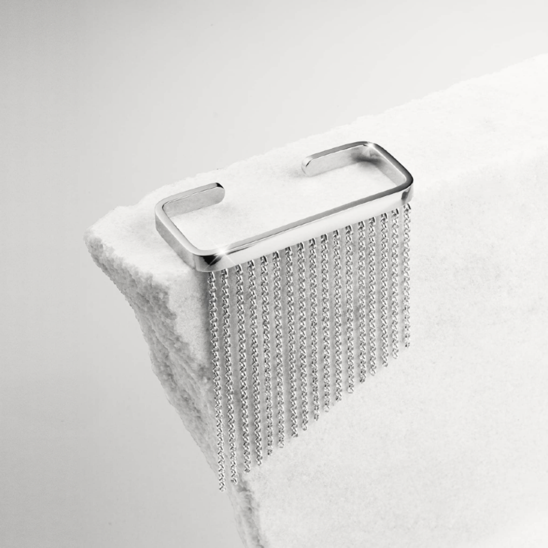 Rain Ring in handmade 925 sterling silver featuring cascading fringe detailing and sculptural form.