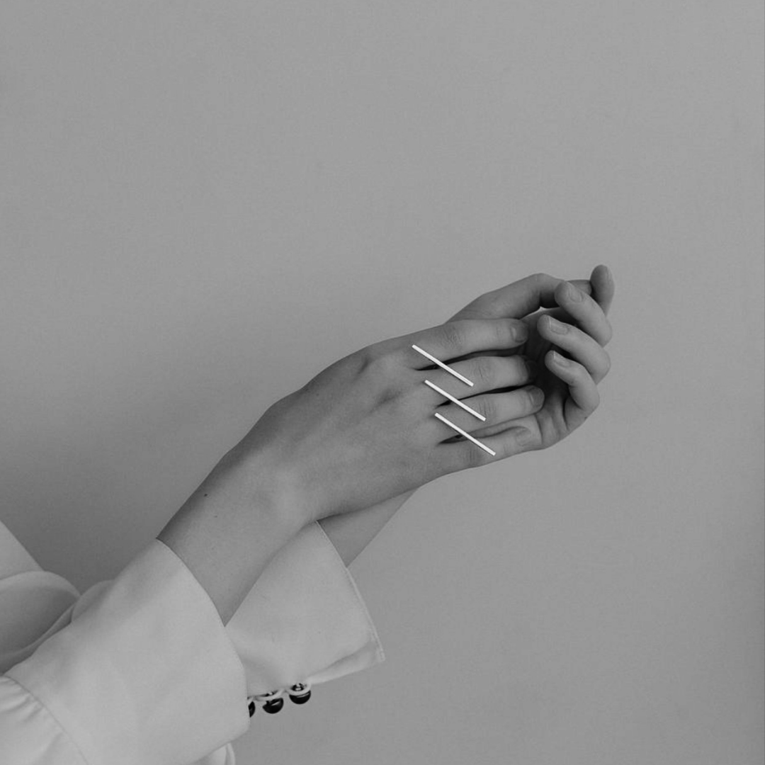 Three Line Ring in handmade 925 sterling silver featuring a sculptural triple-line design.