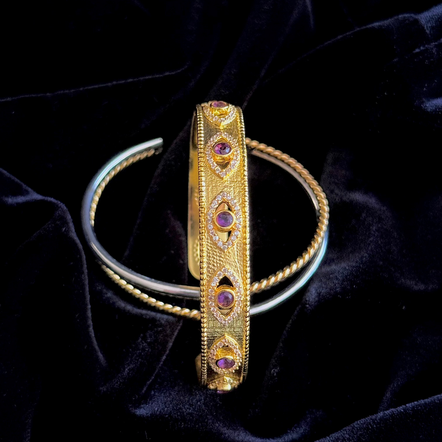 Duality Hand Cuff in 18k gold and silver plating with twisted and smooth dual-band design