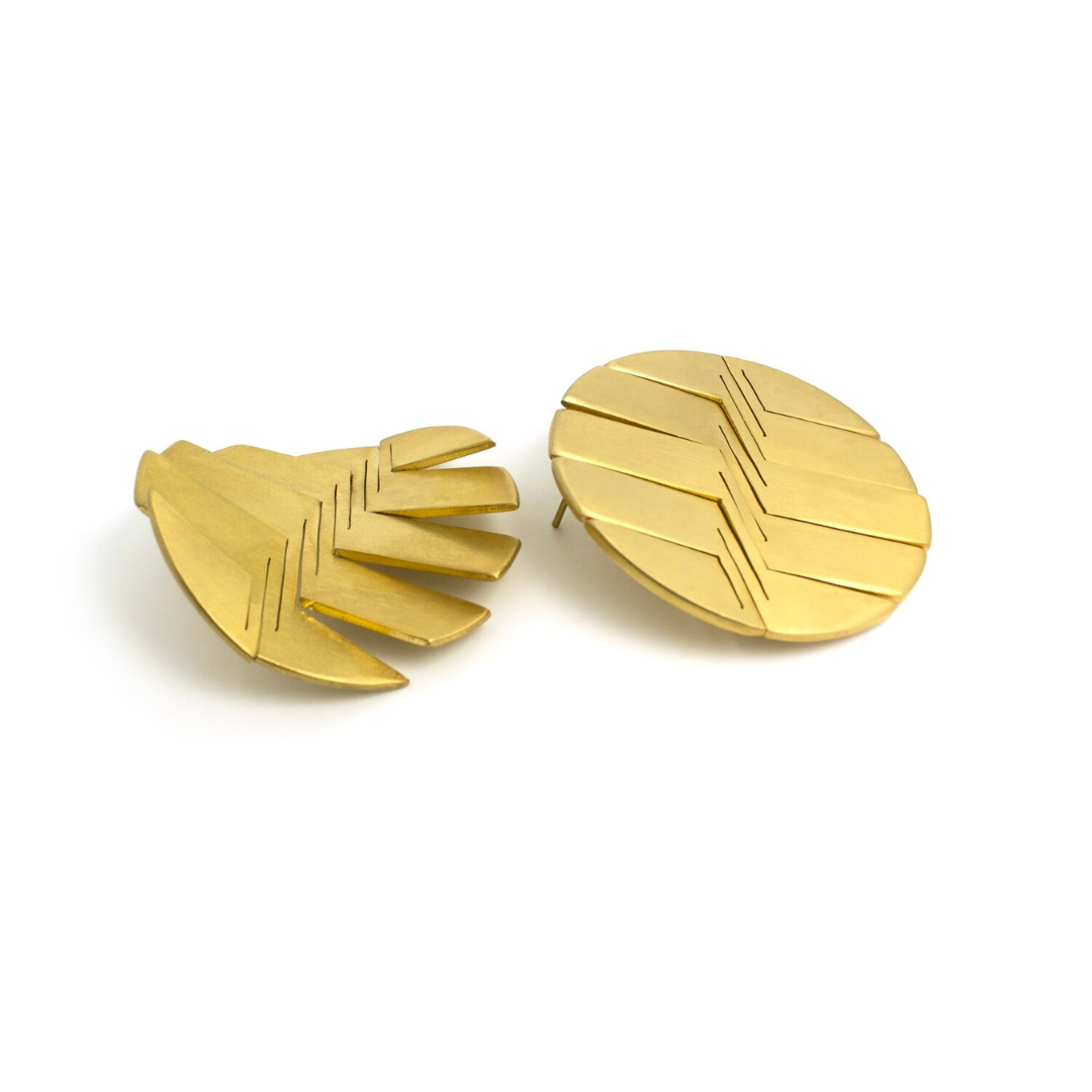 Statement gold plated earrings in a fan-cut circular shape with textured grooves from the LIQUIFY collection