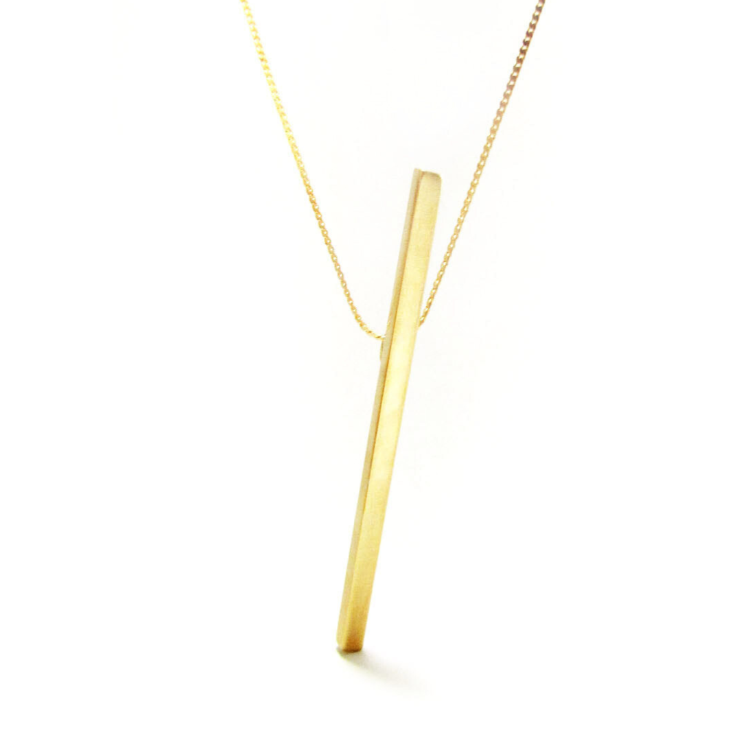 Minimal vertical gold plated pendant on fine chain necklace from the LINE collection