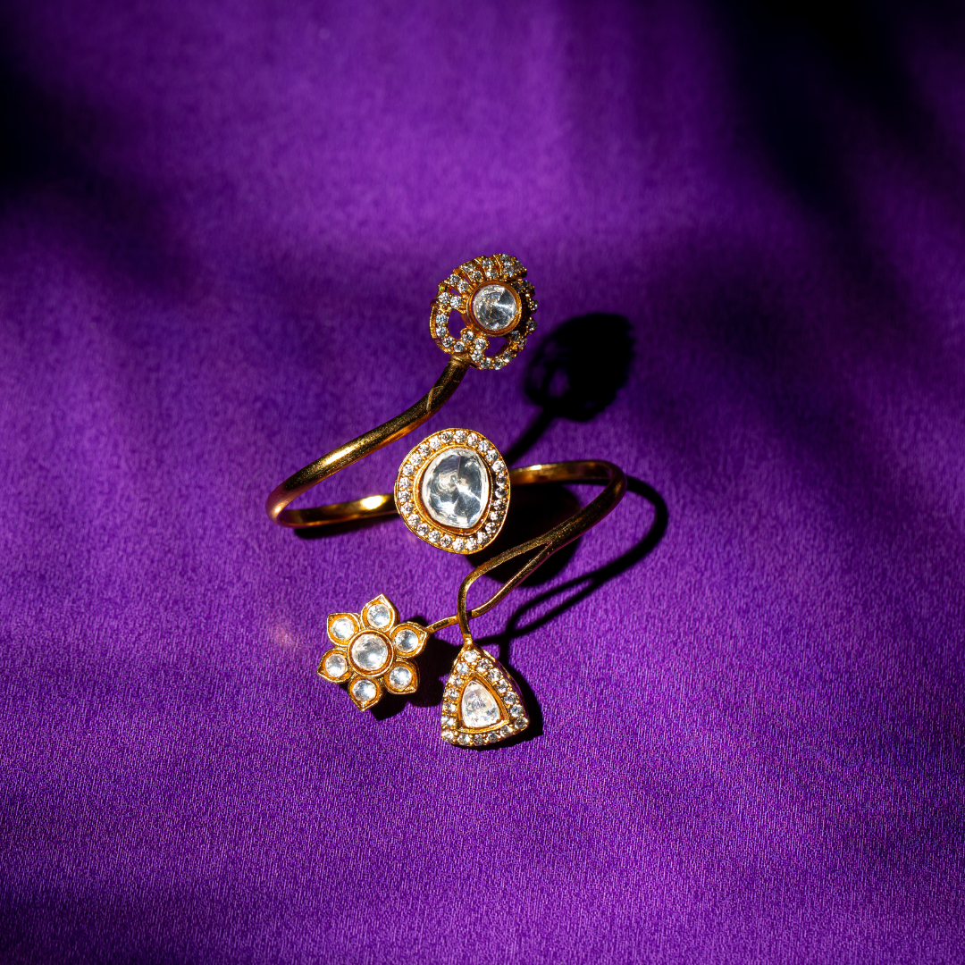 Dual-ring gold brass band with teardrop and floral tops