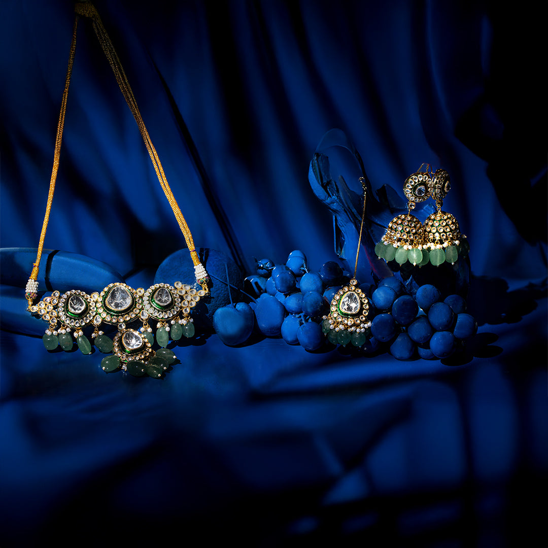 The Heer choker set with earrings - a statement piece featuring glass polki and kundan setting