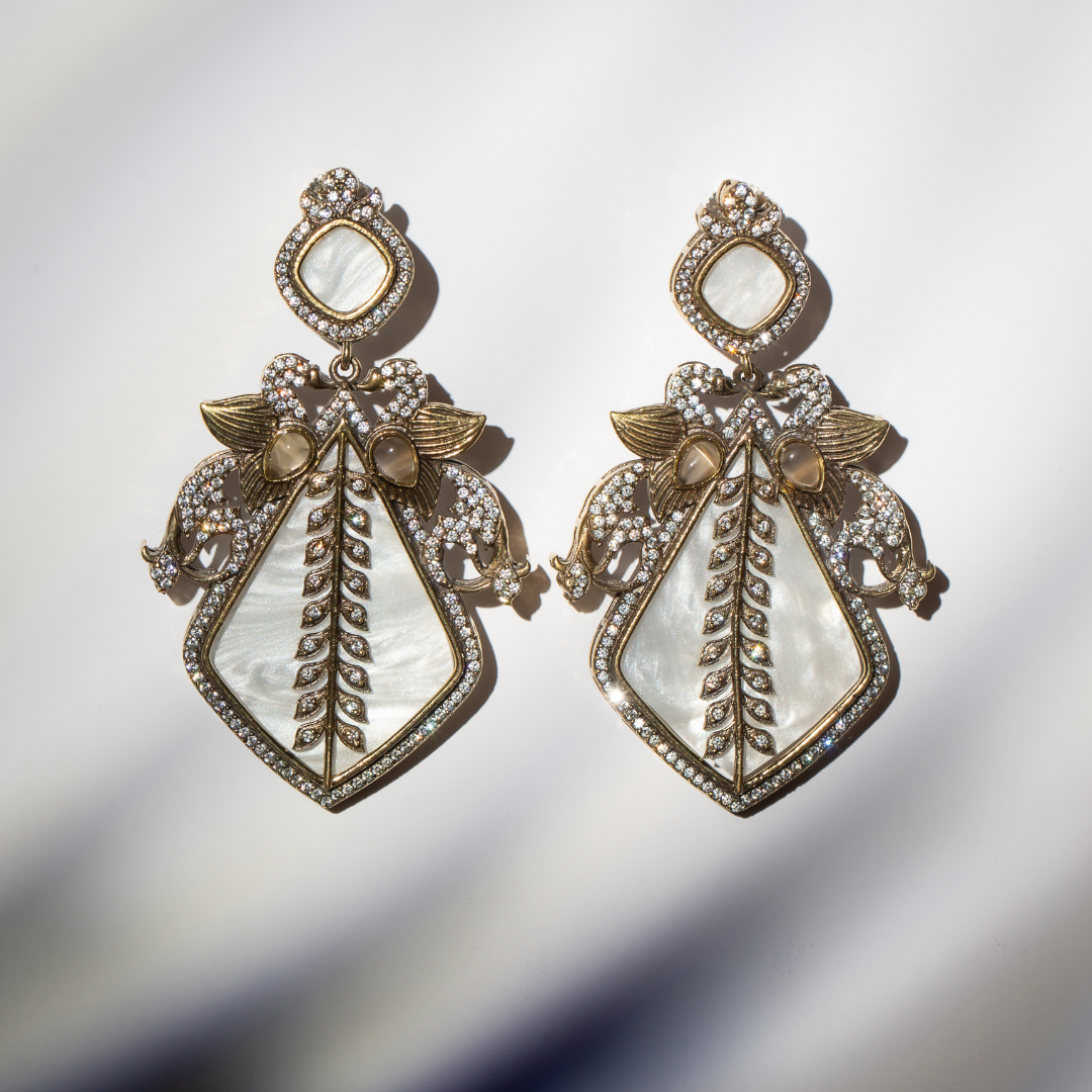 Ivory enamel earrings with gold brass and crystal wings