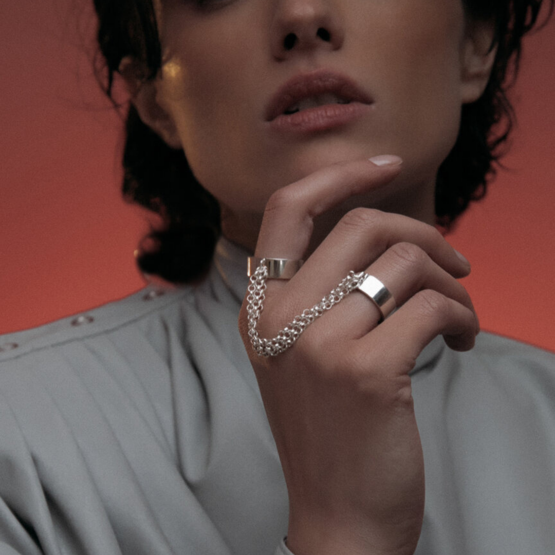 Double Ring with Chains in handmade 925 sterling silver featuring two rings linked with bold chains.