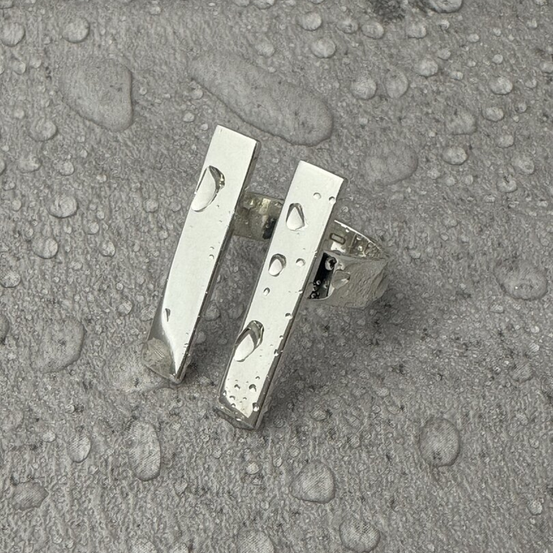 H Ring in handmade 925 sterling silver featuring structured H-shaped design.