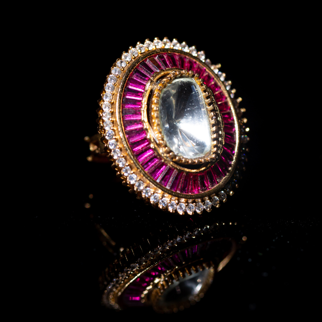 the gulal ring - gold plated fuchsia enamel ring with central crystal.