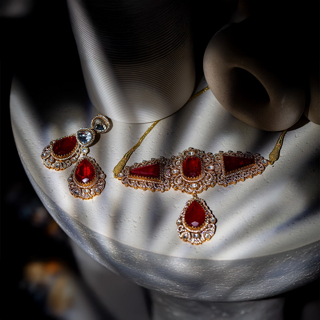 The jugni set - red glass stone choker set with matching earrings.