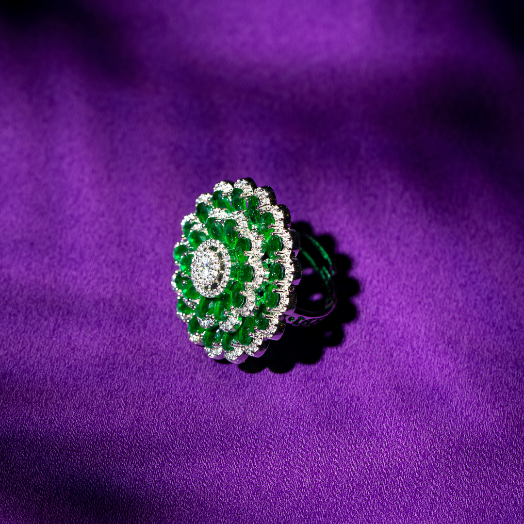 Scalloped green and white gold plated ring with crystal detailing.