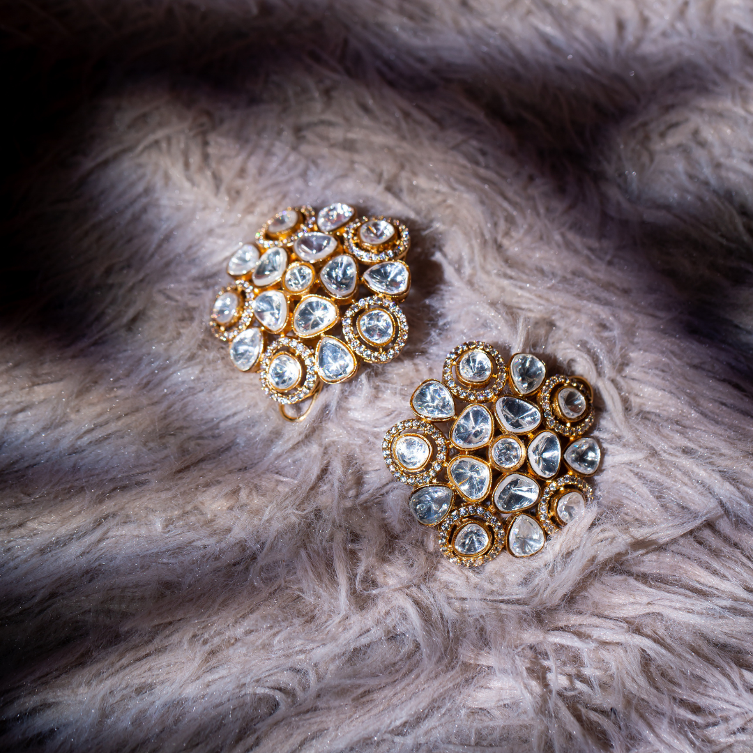 the nakh studs - cluster-shaped gold plated polki glass studs.