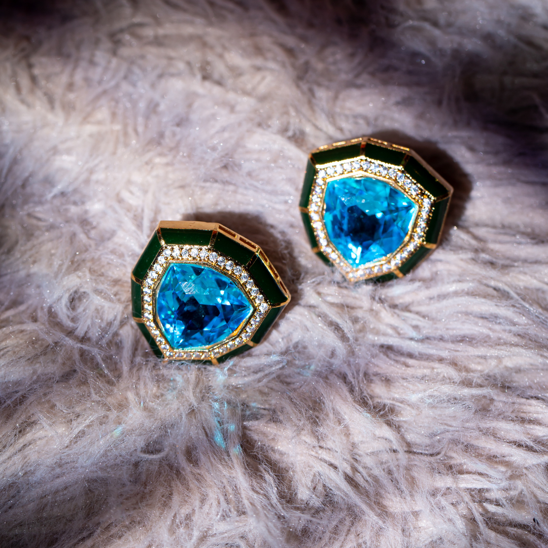 the neel studs - gold plated octagonal blue crystal stud earrings.