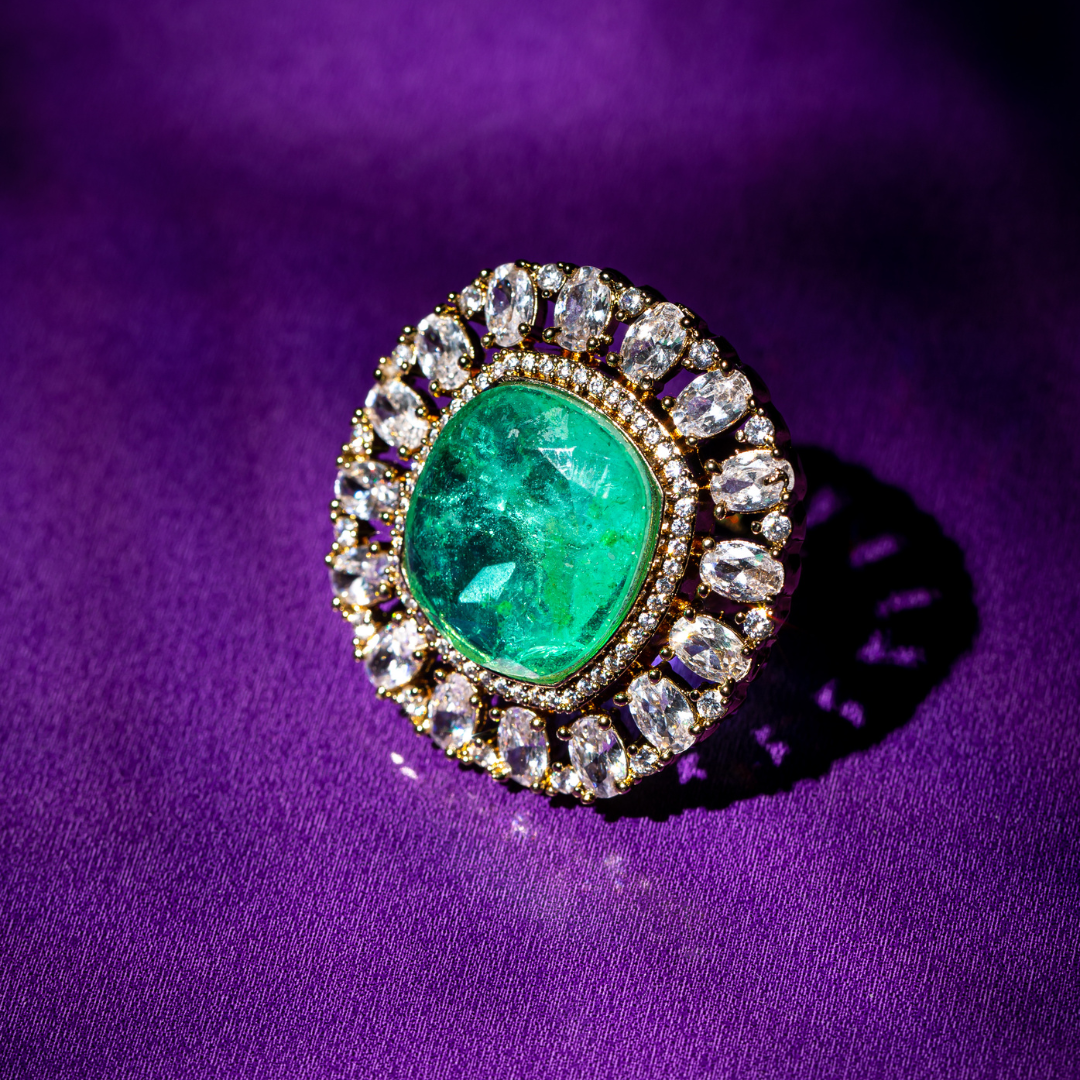 the vera ring - Gold plated oval green stone ring with crystal border.