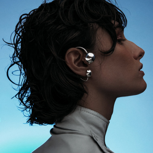 Two-ball mono earring in sterling silver