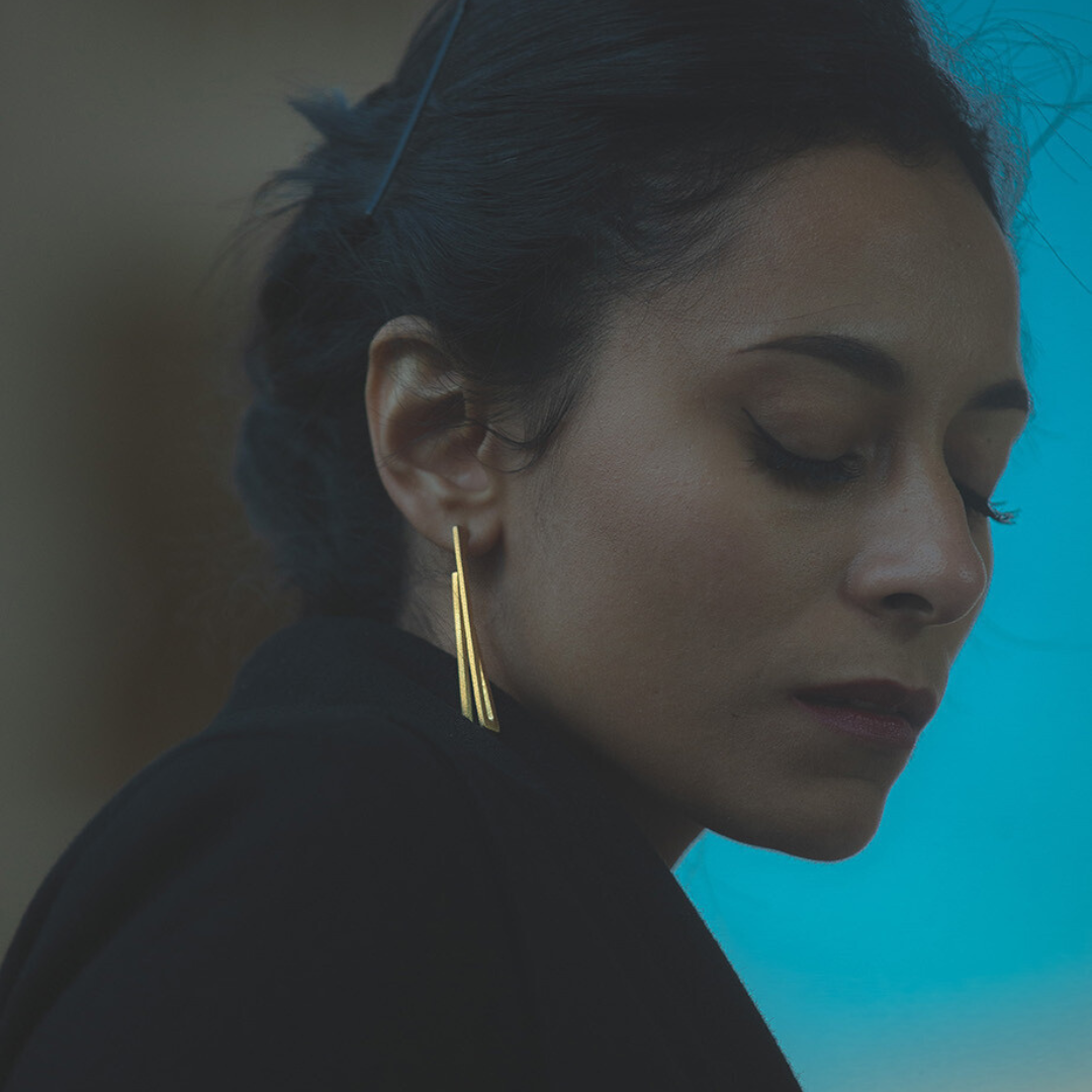 Contemporary gold plated brass earrings with angular 2D rotation design, lightweight and sculptural

