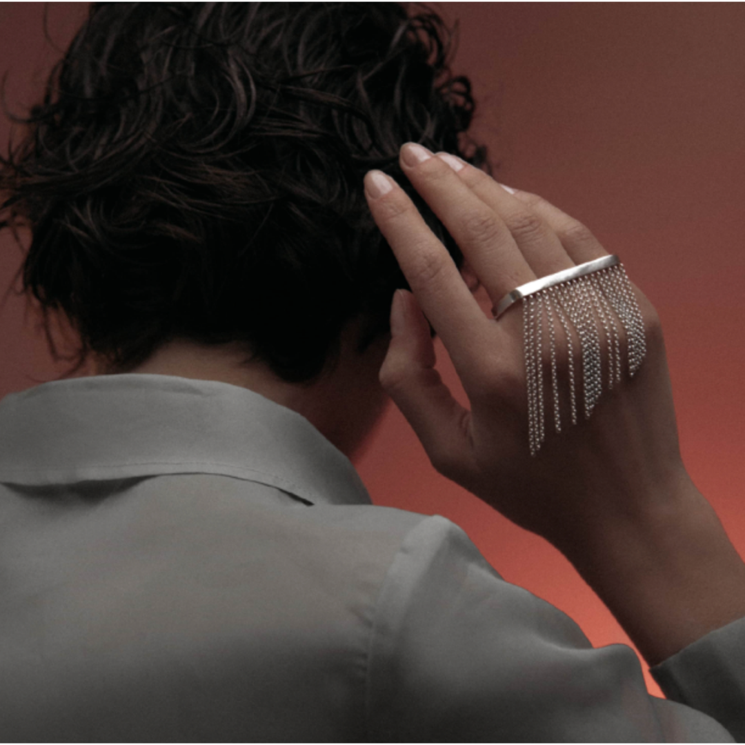 Rain Ring in handmade 925 sterling silver featuring cascading fringe detailing and sculptural form.
