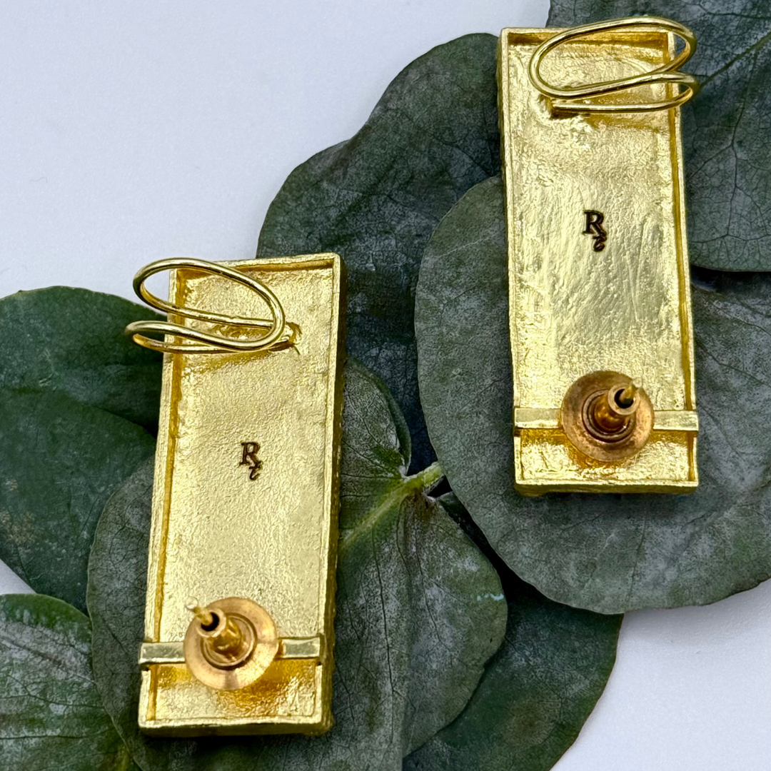 Gold-plated rectangular ear cuffs with textured finish and crescent-edge detailing

