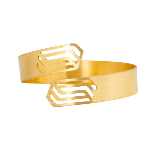 Dancing Pattern gold plated brass bracelet with geometric cutout detailing, contemporary imitation jewelry for women.
