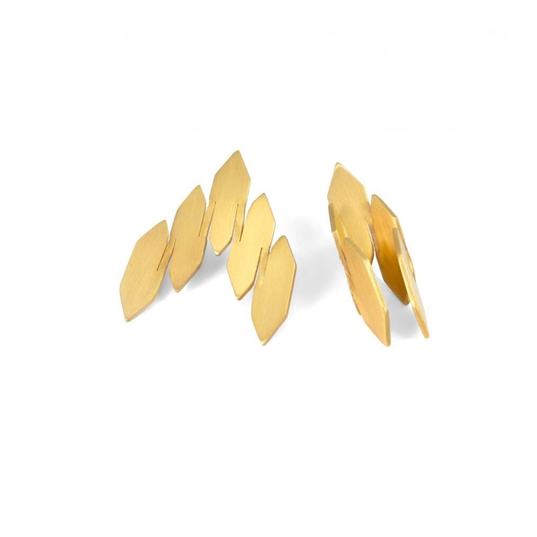 Gold plated modular statement earrings with sculptural leaf-like elements from transformable jewelry collection.