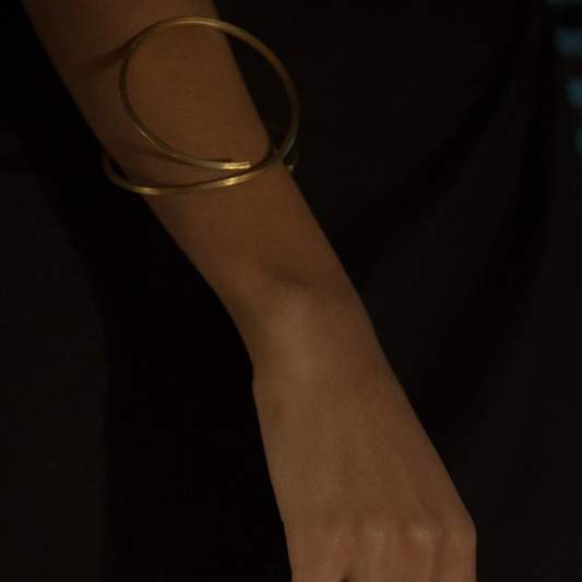 Gold plated brass double hoop bracelet with open design, contemporary imitation jewelry for women

