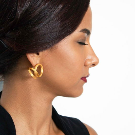 Gold plated brass double hoop earrings, bold statement imitation jewelry with sculptural design

