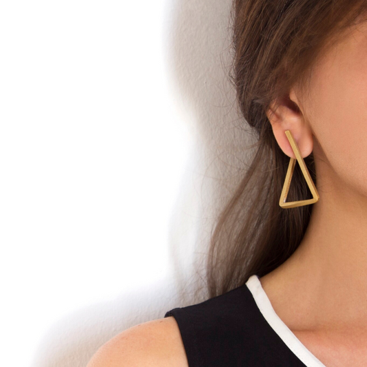 Gold plated brass triangle earrings with open geometric design, modern imitation jewelry from flexible form collection

