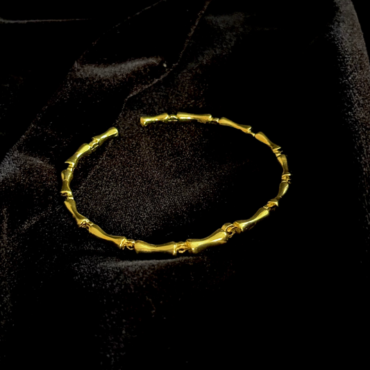 Liner Bracelet in 18k gold plating featuring bamboo-inspired textured links

