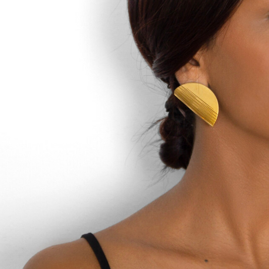 Sculptural half-circle gold plated earrings with etched detailing from the LIQUIFY collection

