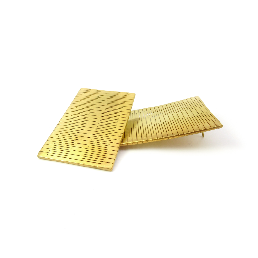 Minimalist gold plated brass earring from the LIQUIFY collection featuring refined etched detailing and a sleek, contemporary design


