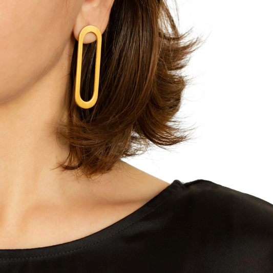 O shape gold plated brass earrings with geometric cutout design, part of bendable imitation jewelry collection

