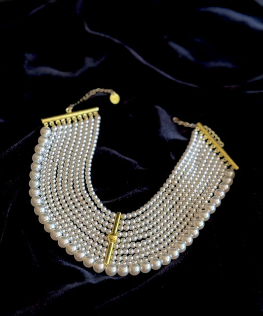 Pearlfect Choker with ten rows of pearls and gold bar detailing in a layered statement design


