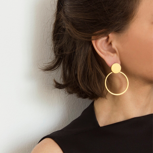 Gold plated brass circular drop earrings with modern open hoop design, imitation jewelry style

