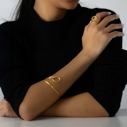 The Curl gold plated brass bracelet and ring set, sculptural fashion jewelry with adjustable modular design