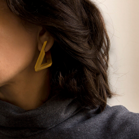 Twisted triangle gold plated earring with geometric optical illusion design, bold modern statement jewelry

