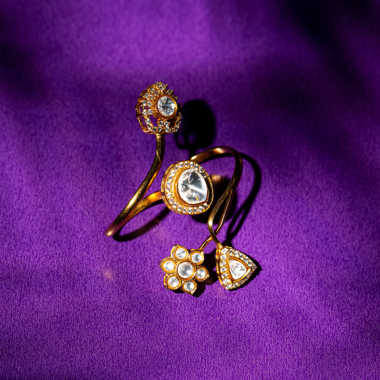 Dual-ring gold brass band with teardrop and floral tops