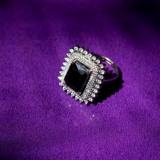 Silver statement ring with square black stone and crystal halo

