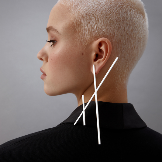 Earrings (Pairs) in handmade 925 sterling silver featuring long vertical linear design.

