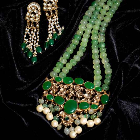 Green beaded necklace set with kundan work and pearl drops


