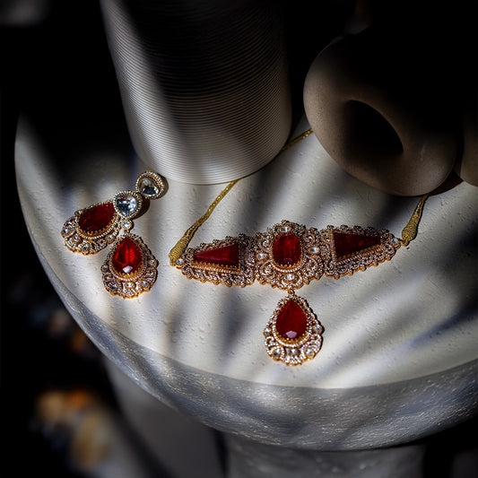 The jugni set - red glass stone choker set with matching earrings.

