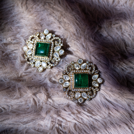 the nuur studs green square centre studs with crystal detailing.

