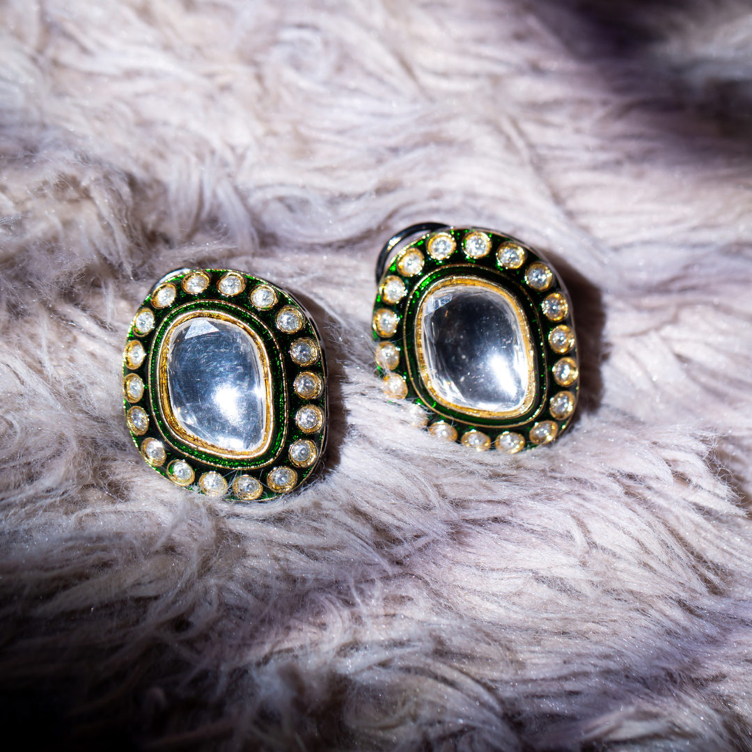 the sufi studs gold plated studs with enamel, crystal and glass polki.

