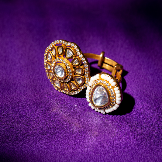 The Taal Ring - Dual design gold plated ring featuring glass polki and carved detailing.

