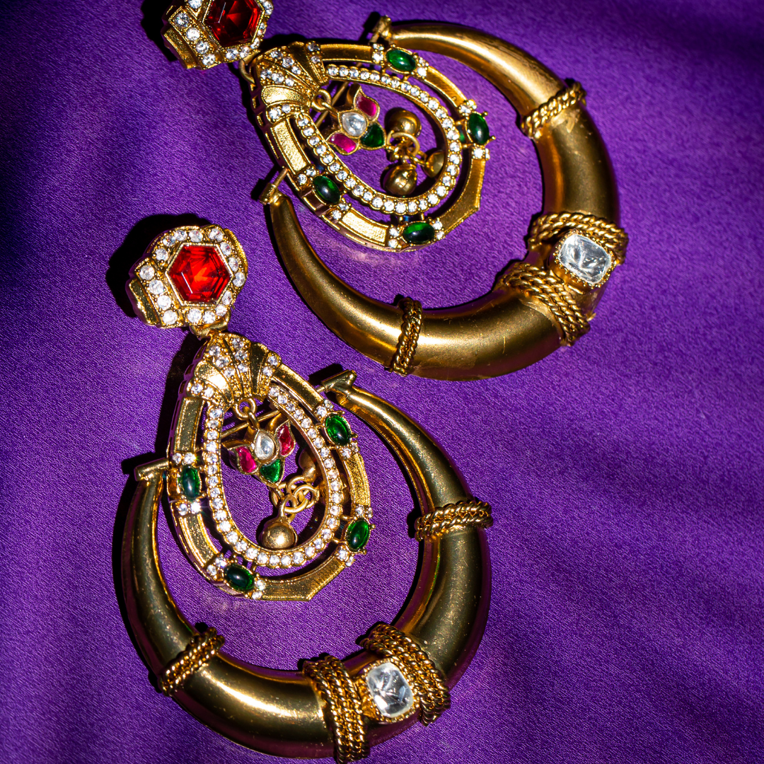 Gold plated ruby red kundan stone earrings

