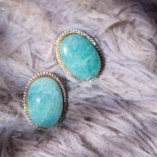 the vani studs - gold plated brass base with turquoise stone with crystal detailing.

