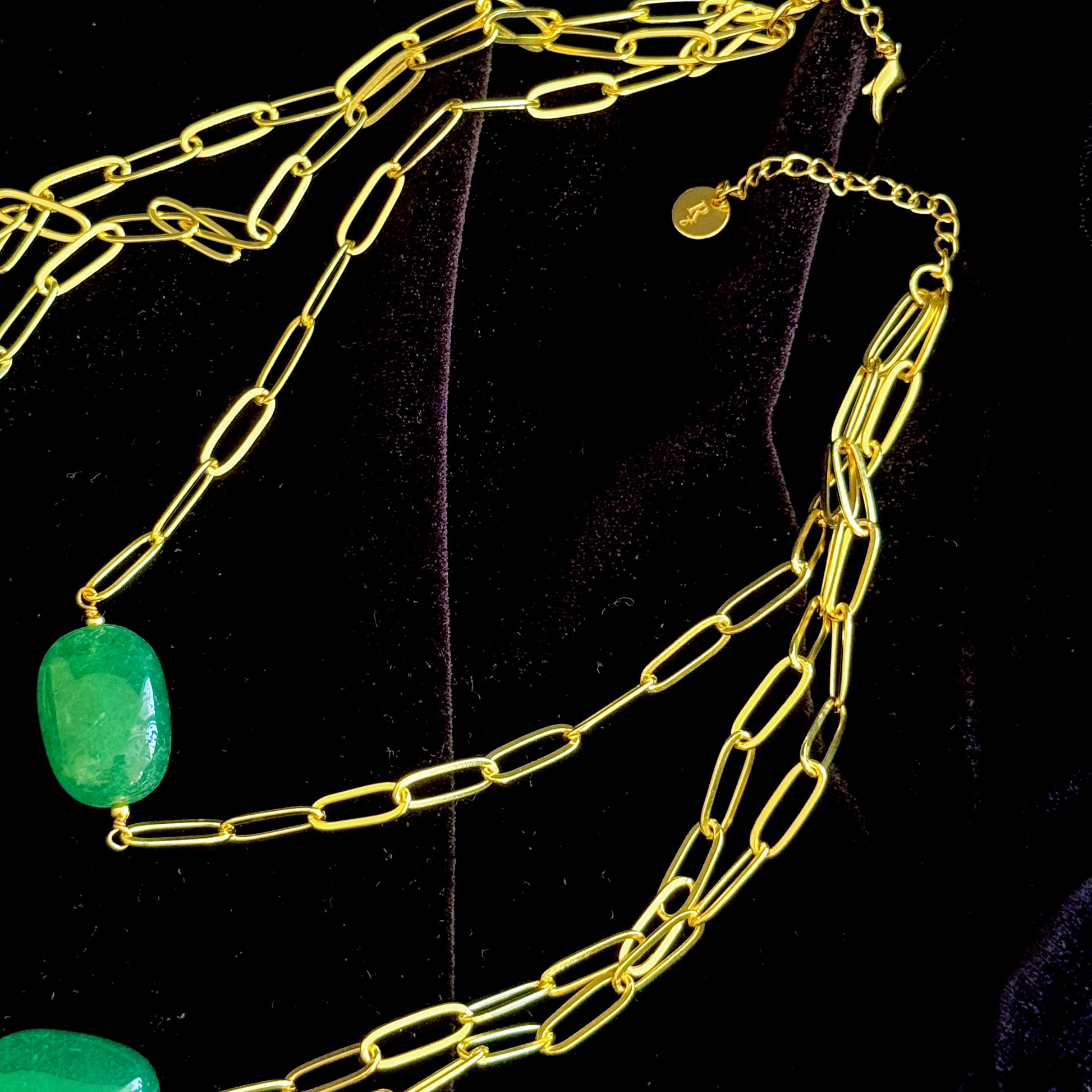 Trilogy Necklace with emerald-toned oval stones and gold-plated layered paperclip chains

