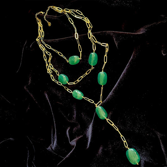 Trilogy Necklace with emerald-toned oval stones and gold-plated layered paperclip chains

